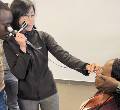 Mary Jue Xu, MD, demonstrates flexible nasolaryngoscopy at the University of Global Health Equity campus in Butaro, Rwanda.