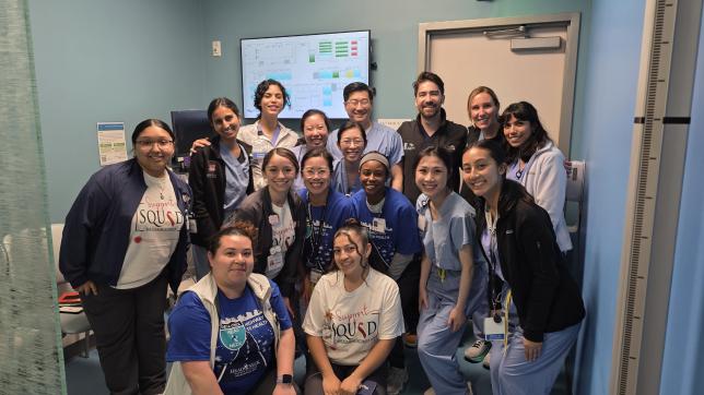 Group of volunteers at UCSf pose for a photo at a free cancer screening event.