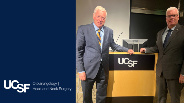 Dr. Andrew Murr and Dr. Jeffrey Bumpous pose by a podium during the 2025 Francis A. Sooy, M.D. Endowed Lectureship.